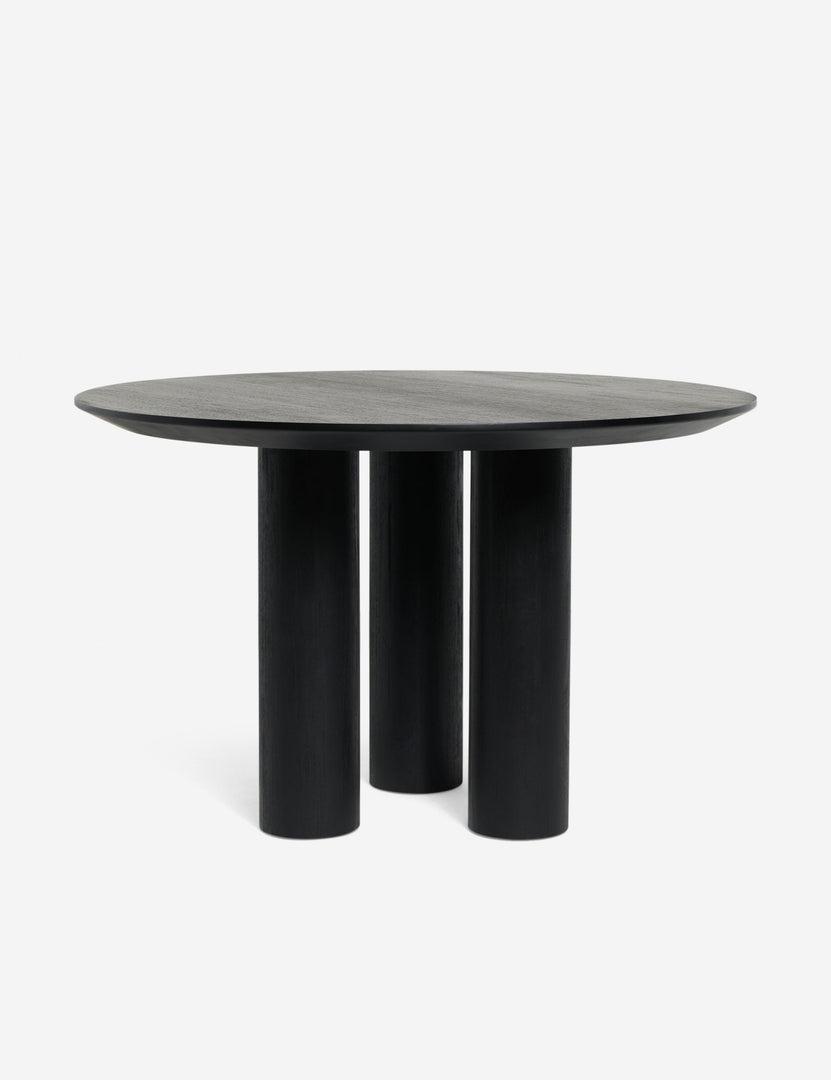 #color::black | Mojave round minimalist dining table in black.