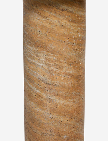 #color::Canyon-Faux-Travertine | Close up of the Mona round stone drink table.