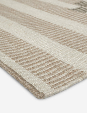 Close up of the Orion handwoven neutral striped outdoor rug by Sarah Sherman Samuel.