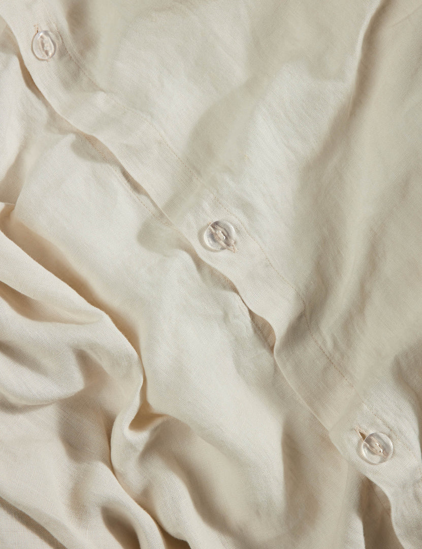 #color::cream #size::full-queen #size::king-cal-king #type::duvet-cover #type::duvet-set | Close up view of the Essie soft, breathable hemp duvet cover in cream