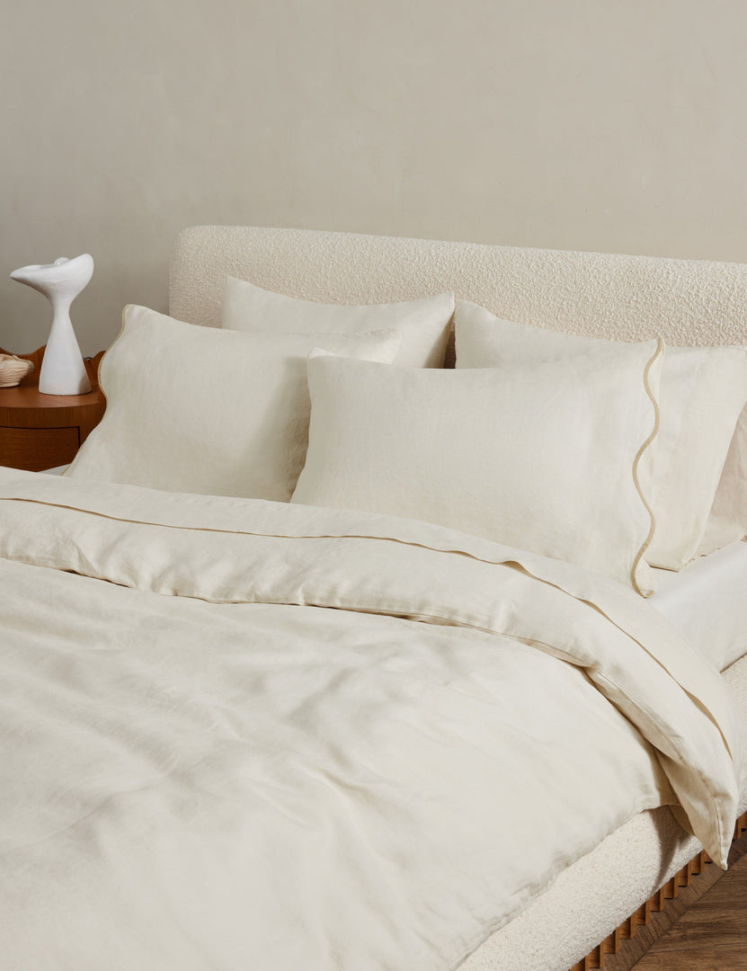 #color::cream #size::full-queen #size::king-cal-king #type::duvet-cover #type::duvet-set | Angled view of the Essie soft, breathable hemp duvet cover in cream