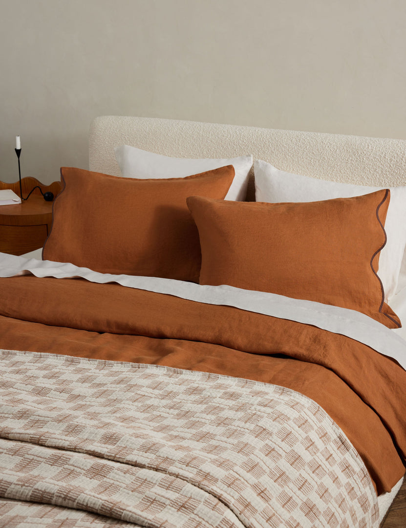 #color::umber #size::full-queen #size::king-cal-king #type::duvet-cover #type::duvet-set | Essie soft, breathable hemp duvet cover in rust umber with basketweave bed blanket