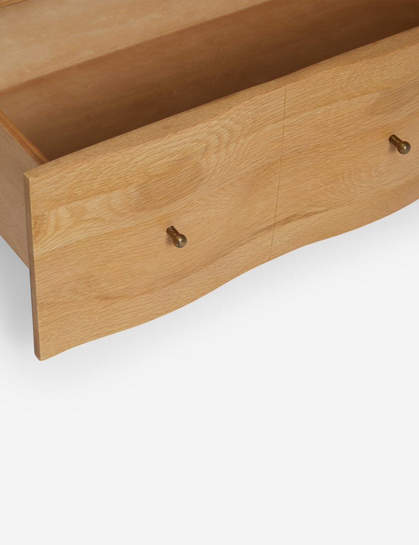 #color::natural | Close up of the open drawer of the Otelia wide profile two drawer nightstand in natural wood