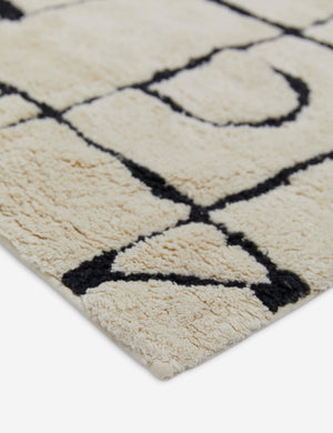 Close up view of the Ottilie modern geometric bath mat