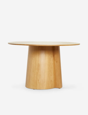 Pau oak veneer round dining table with a pedestal base