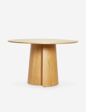 Pau oak veneer round dining table with a pedestal base