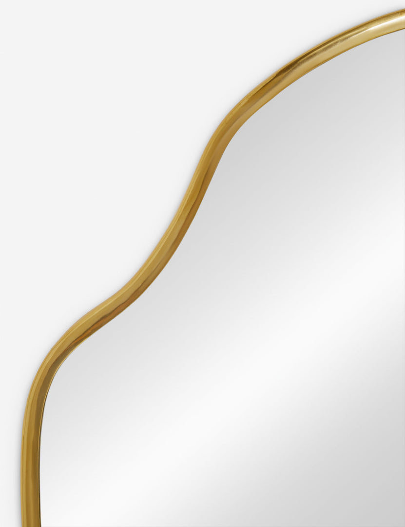 #color::gold  #size::small | The gold curved frame on the small puddle mirror