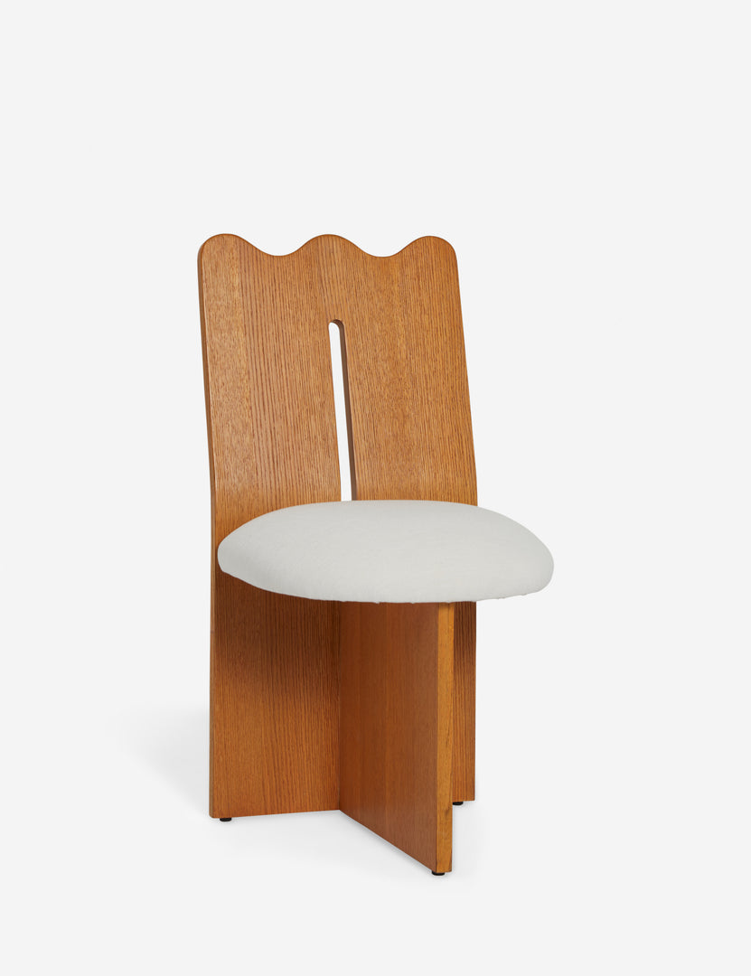 #color::honey-oak | Angled view of the Ripple tall, wavy back wooden dining chair