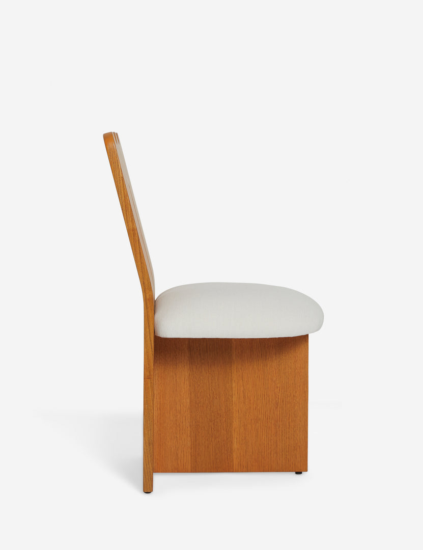 #color::honey-oak | Side view of the Ripple tall, wavy back wooden dining chair