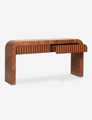 Sabal burl wood waterfall console table by Carly Cushnie with one drawer opened.