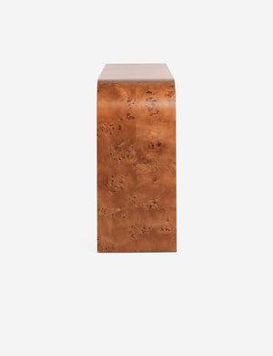 Side profile of the Sabal burl wood waterfall console table by Carly Cushnie.