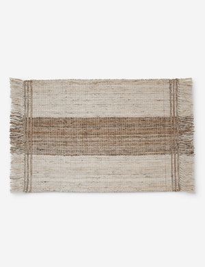 Small Sabriel handwoven large-scale striped fringed outdoor rug.