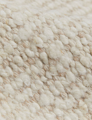 The hand-woven construction of the Taos ivory rug