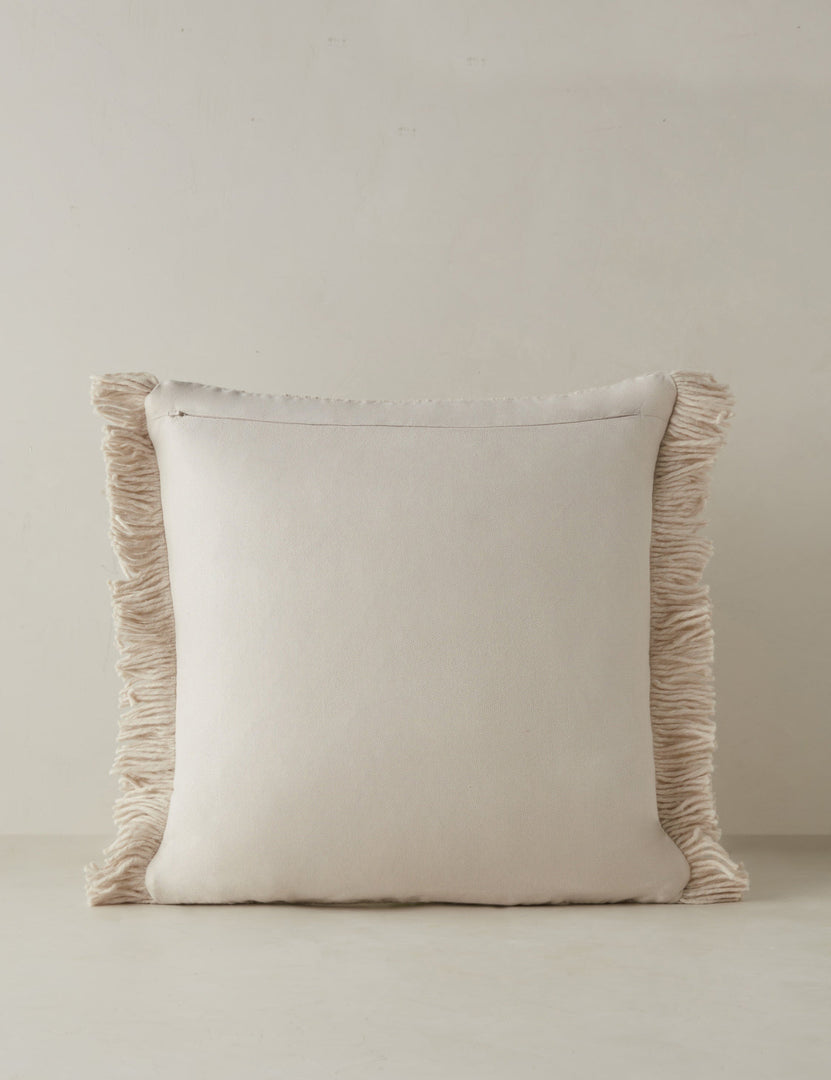 #color::ivory #style::square | Back of the Thorpe chunky woven fringed outdoor throw pillow in ivory.