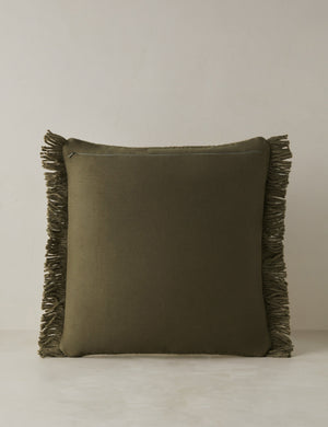 Back of the Thorpe chunky woven fringed outdoor throw pillow in moss.