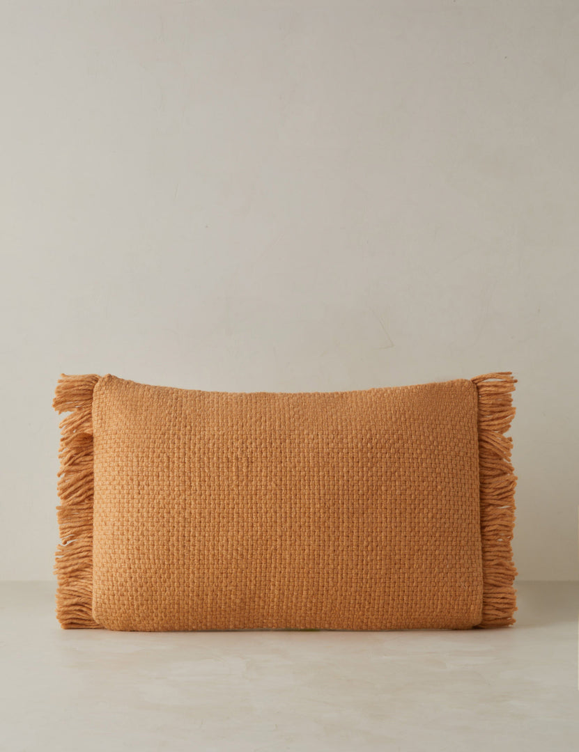 #color::terracotta #style::lumbar | Thorpe chunky woven fringed outdoor lumbar pillow in terracotta.