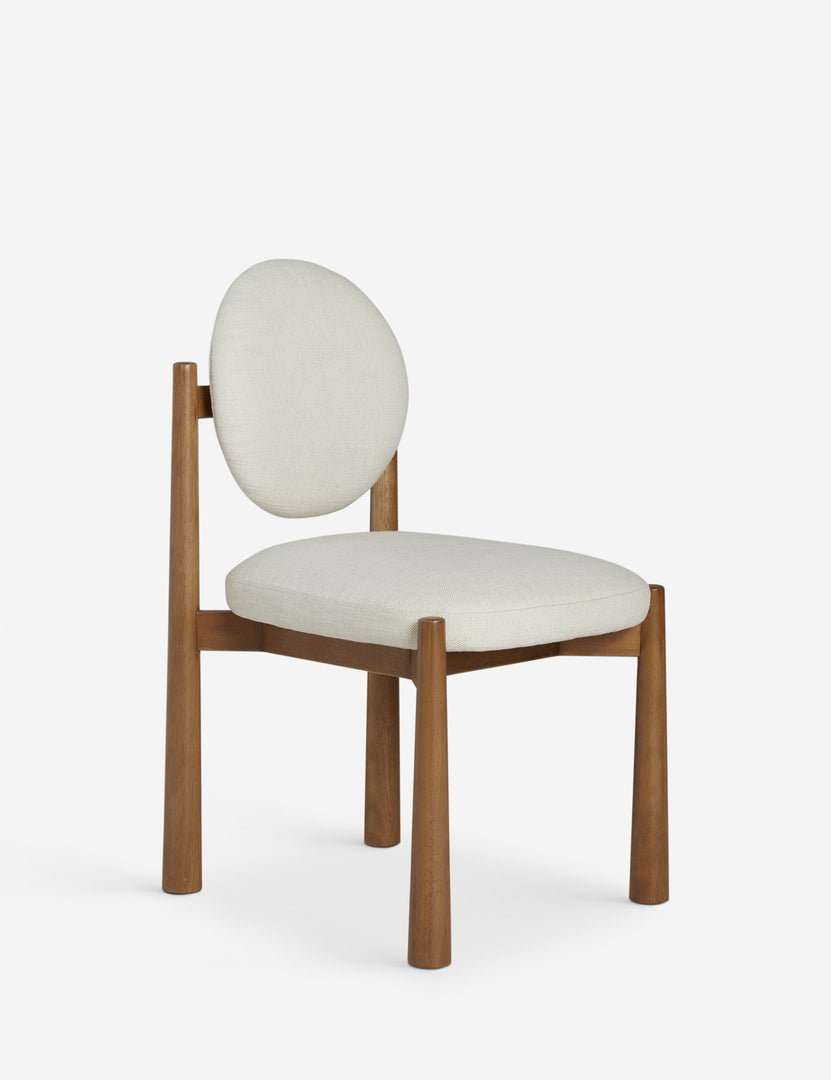 #color::ivory-basketweave | Angled view of the Truett modern dining chair.