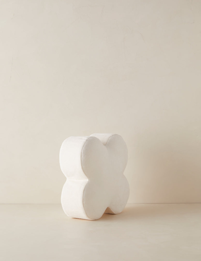 #color::ivory | Angled view of the Velvet clover shaped accent pillow in ivory