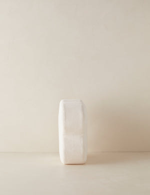 Side view of the Velvet clover shaped accent pillow in ivory