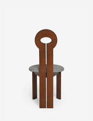 Rear view of the Whit honey wood sculptural dining chair by sarah sherman samuel