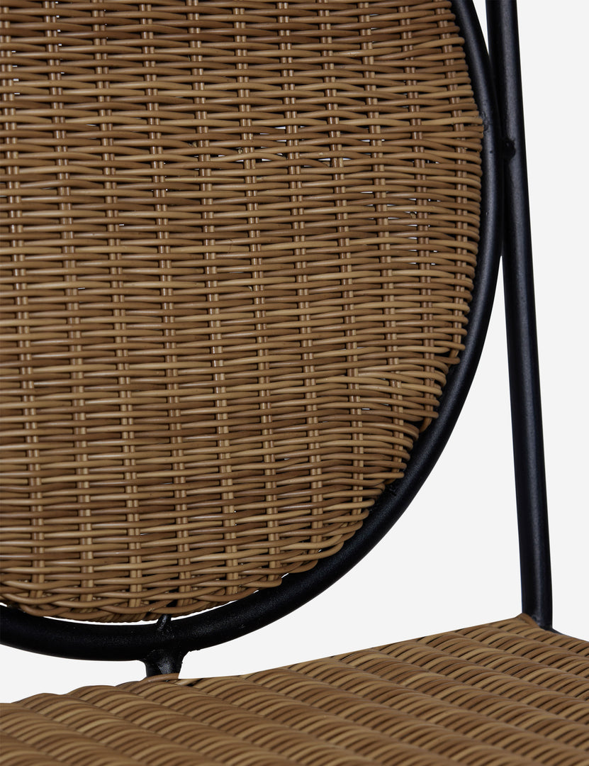 #color::natural | Close up of the Ziggy modern wicker outdoor dining chair by Sarah Sherman Samuel.
