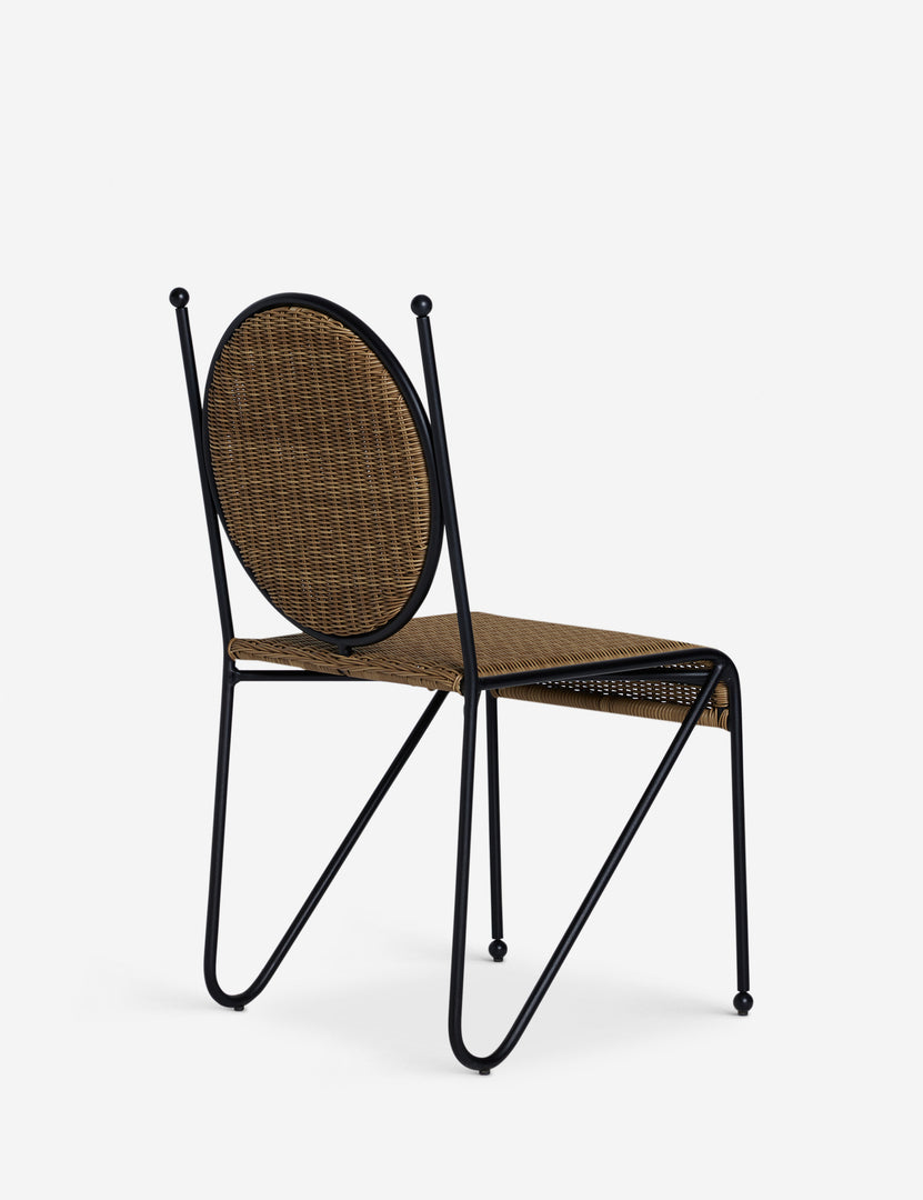 #color::natural | Angled back view of the Ziggy modern wicker outdoor dining chair by Sarah Sherman Samuel.