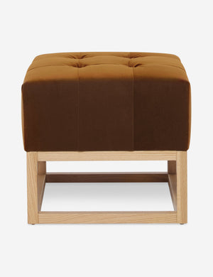 Cognac Velvet Grasmere Ottoman with an upholstered cushion and airy wooden frame by Ginny Macdonald