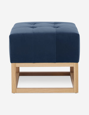 Harbor Blue Velvet Grasmere Ottoman with an upholstered cushion and airy wooden frame by Ginny Macdonald