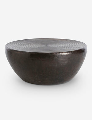 Hosanna Iron Round Coffee Table with a repousse ringed detail on the top