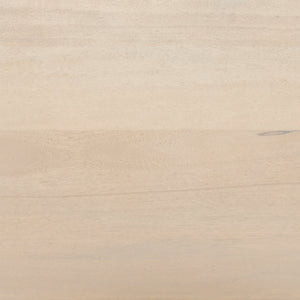 Detailed shot of the whitewashed mango wood on the Hannah whitewashed mango wood cabinet with cane doors