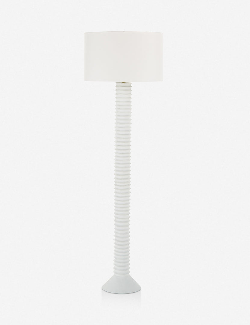 | Nabu white metal floor lamp with ribbed base and gold accents by Regina Andrew