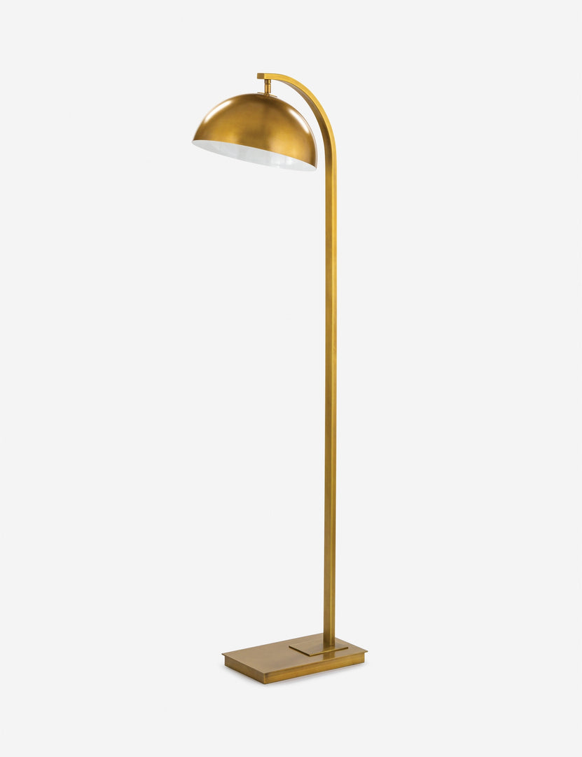 #color::natural-brass | Angled view of the Otto natural brass arched floor lamp by Regina Andrew