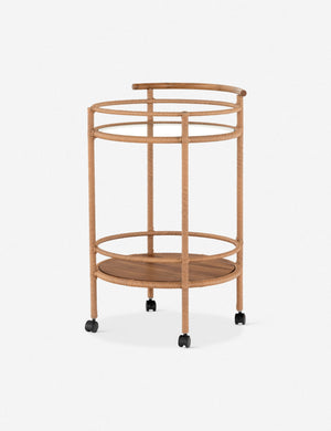 Annika round teak rolling outdoor bar cart.