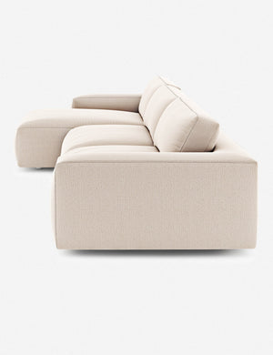 Side of the Mackenzie ivory linen left-facing sectional sofa