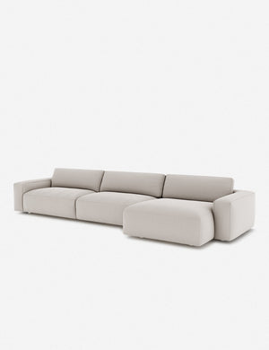 Angled view of the Mackenzie cloud white linen right-facing sectional sofa
