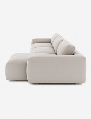 Side of the Mackenzie cloud white linen right-facing sectional sofa