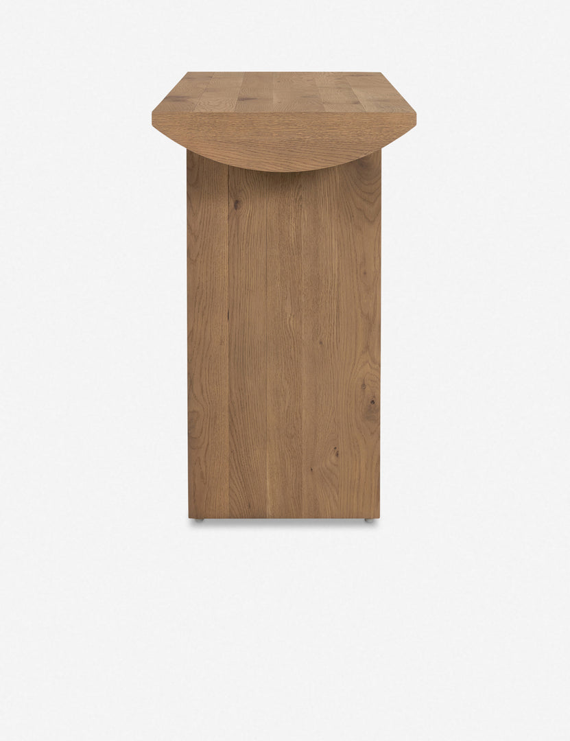 #color::natural | Side view of the Remwald sculptural oak wood console table.