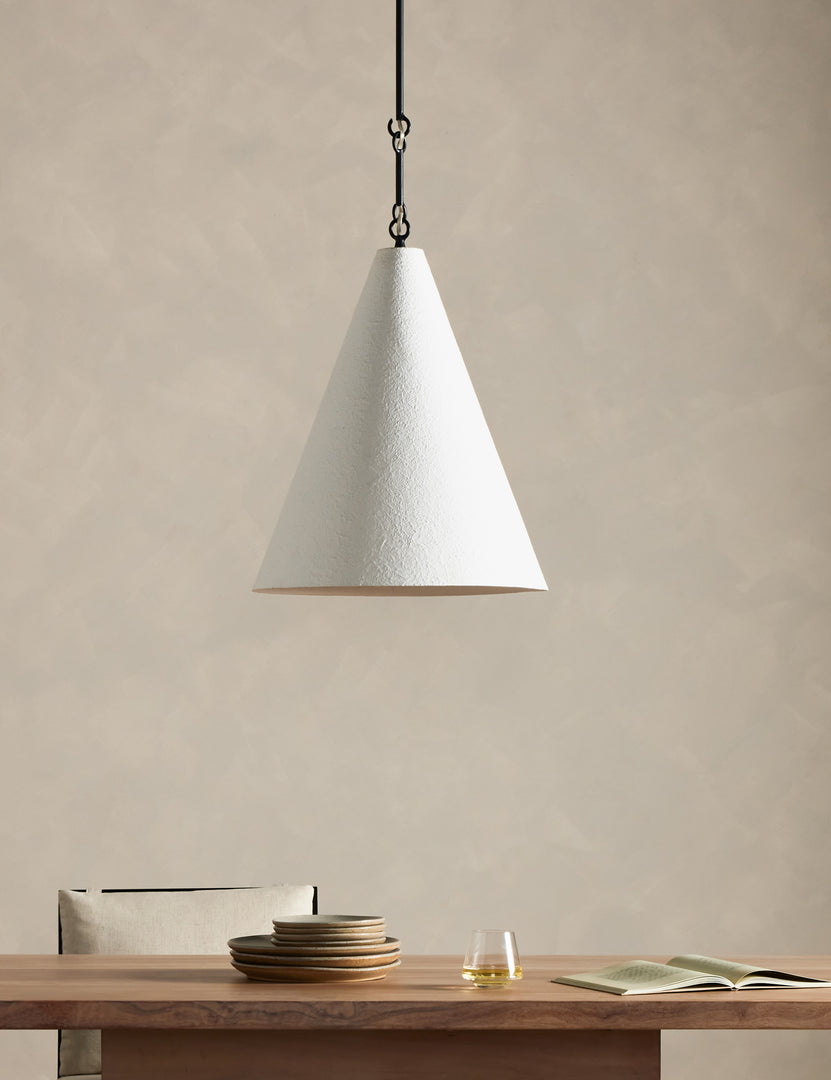 #size::19.5-dia #color::white | Ashwin sleek cone pendant light hanging above a dining table.