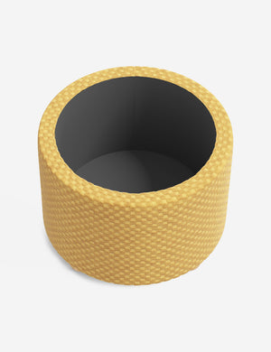 The storage space inside the Kamila Hi-Lo Checker Goldenrod 24-inch ottoman