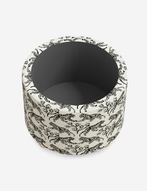 The storage space inside the Kamila Tiger Ivory 24-inch ottoman