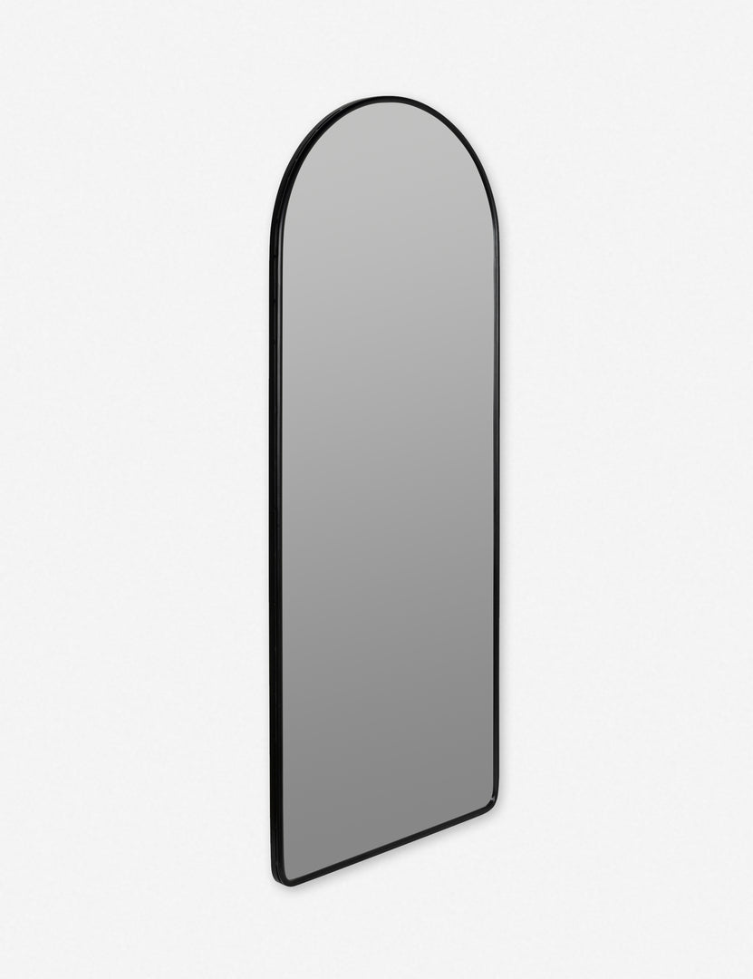 #color::black | Angled view of the Shashenka black arched floor mirror