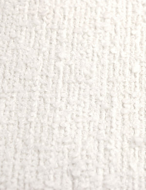 Detailed shot of the white boucle on the Adara white boucle upholstered bed.