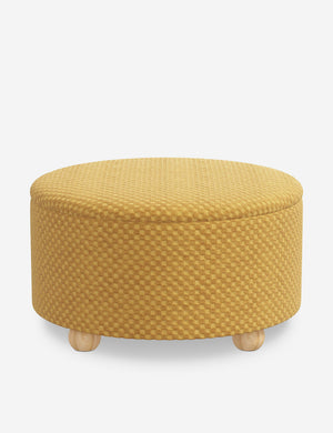 Angled view of the Kamila Hi-Lo Checker Goldenrod 34-inch ottoman