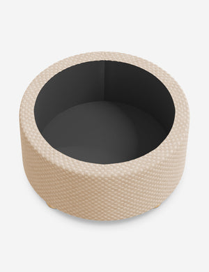 The storage space inside the Kamila Hi-Lo Checker Natural 34-inch ottoman