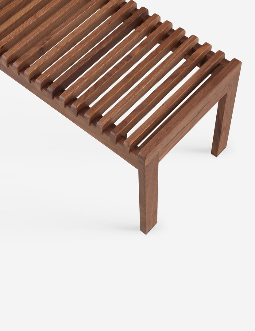 #color::walnut | Corner of the Olson mid-century slatted wood bench in walnut.