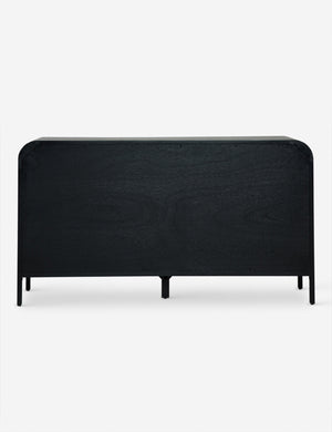 Back of the brooke black oak 6-drawer rounded dresser