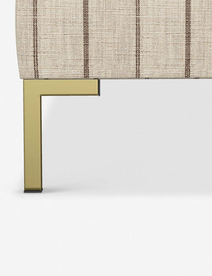 The golden leg on the Deva Natural Stripe platform bed