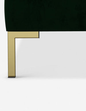 The golden leg on the Deva Emerald Velvet platform bed