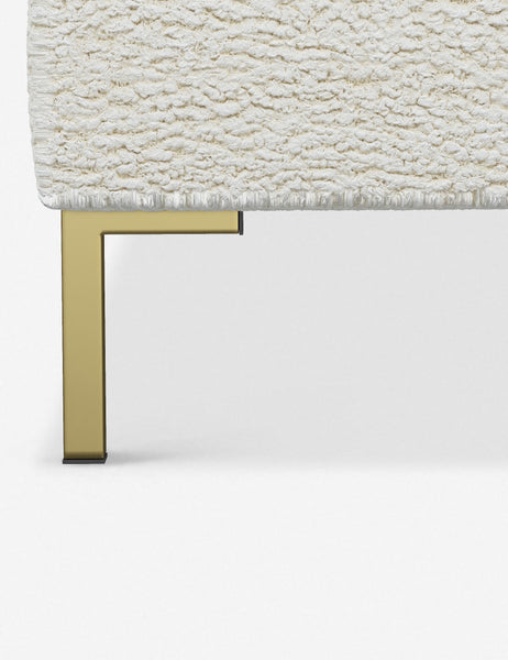 #color::cream-sherpa #size::twin #size::full #size::queen #size::king #size::cal-king | The golden leg on the Deva Cream Sherpa platform bed