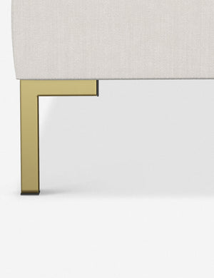 The golden leg on the Deva Snow Velvet platform bed